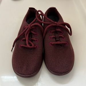 Dark red lightly worn Allbird wool runners